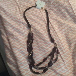 Long length brown rope necklace. Gold tone.